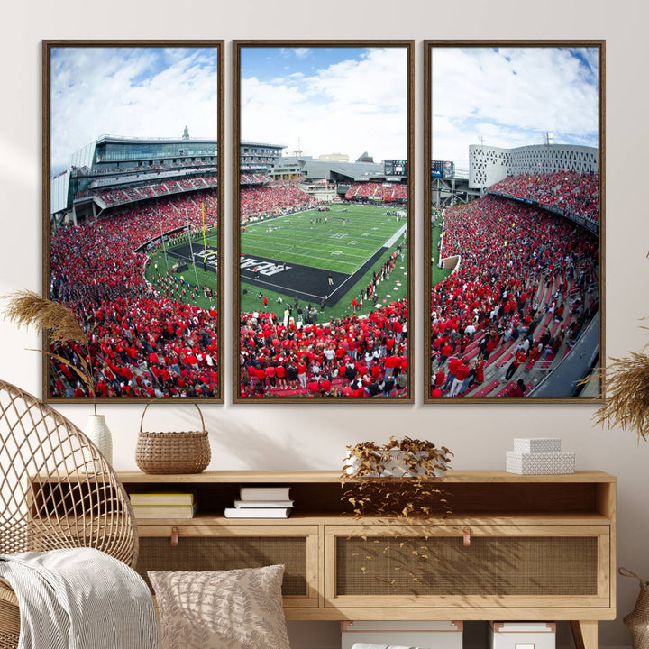 The wall showcases a Nippert Stadium canvas print of the Cincinnati Bearcats.