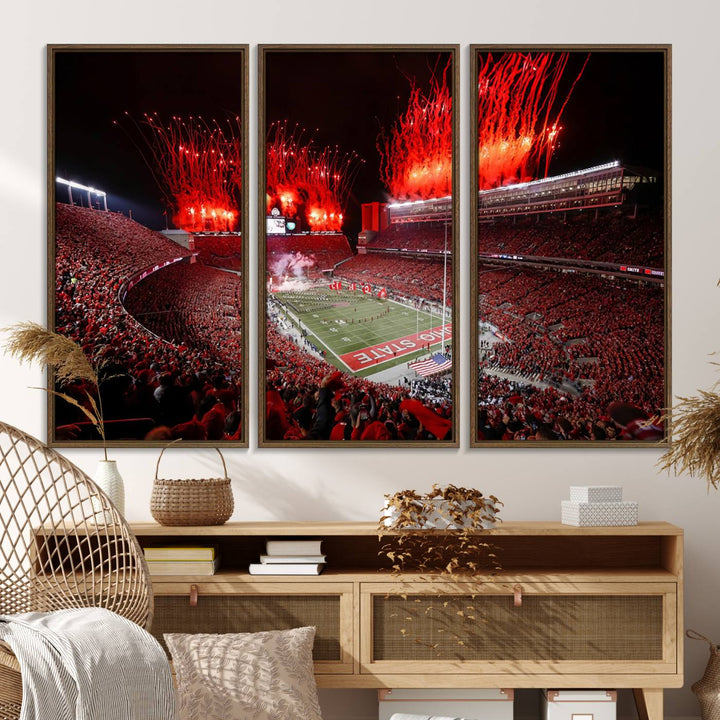 A vibrant red canvas art of a packed Ohio State Buckeyes stadium at night with fireworks.