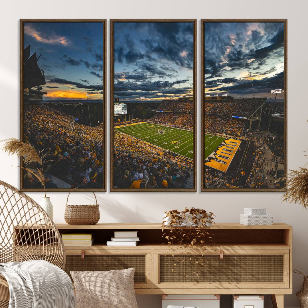 Laramies War Memorial Stadium Print captures a stunning scene of the stadium during sunset, set under a partly cloudy sky illuminated by bright lights.