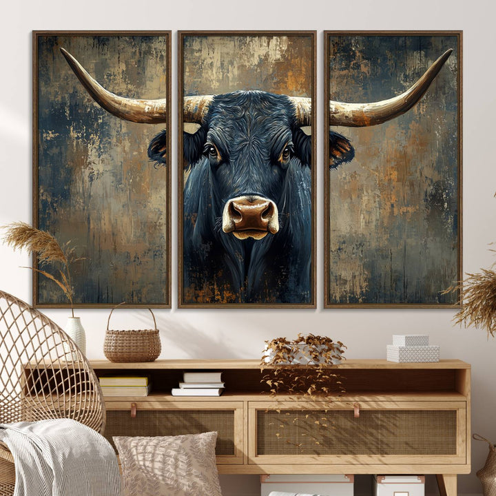 The Texas Western Wall Art Canvas Print showcases a Longhorn Bull set against an abstract brown and gray backdrop, making it perfect for rustic decor.