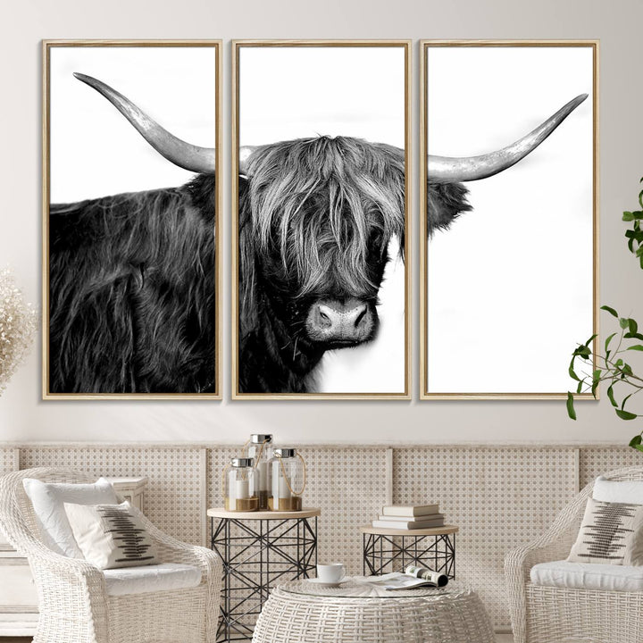 The Black and White Highland Cow Multi Panel Wall Art Canvas Print with UV-protection hangs prominently.