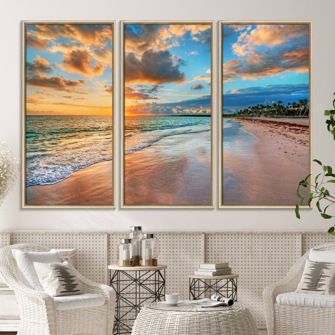 A wall displays Sunset Ocean Waves on Tropical Beach 3-panel canvas art.