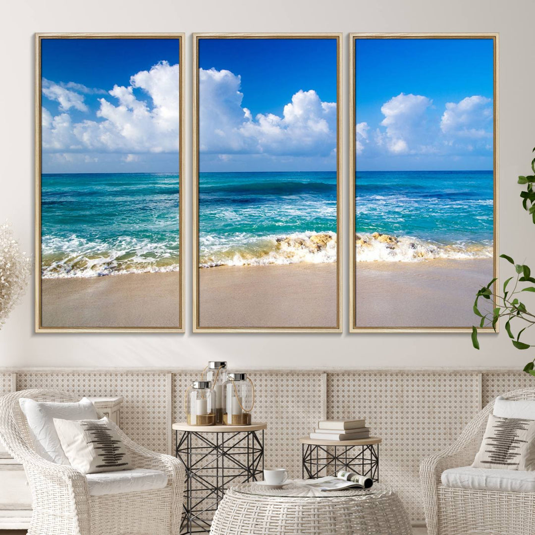 The Tropical Beach 3-Panel Canvas Wall Art features ocean waves gently lapping on a beach under blue skies, making it an ideal choice for coastal decor.