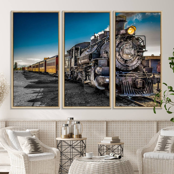 The Train Wall Art Canvas Print features a vintage steam train with a bright headlight.