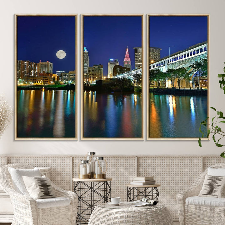 Cleveland City Lights Night Skyline Wall Art canvas showcases a moonlit cityscape reflected on water.