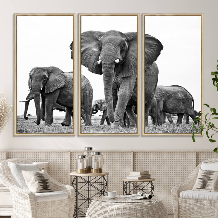 A modern dining area features a Black White Elephant Family Wall Art Canvas Print.