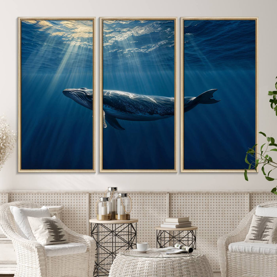 The Whale under Ocean wall art canvas print graces the white wall.