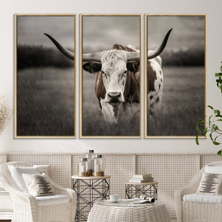 The Texas Longhorn Cow Canvas Wall Art Print adds a rustic touch to a living room.