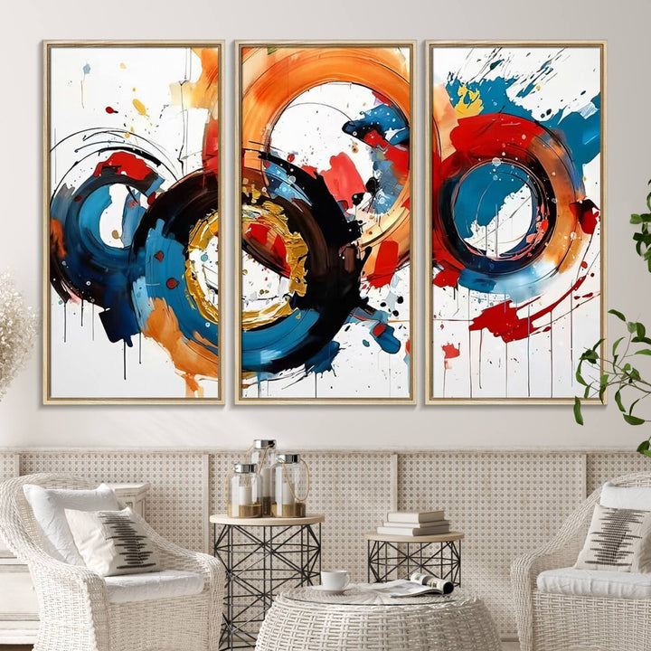 The Abstract Wall Art Rings Canvas Print, with its bold and colorful circular strokes, adorns the wall, epitomizing contemporary design.