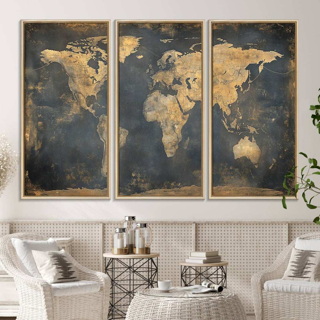 The Grunge World Map Canvas Wall Art features golden tones and is displayed against a white-paneled wall.
