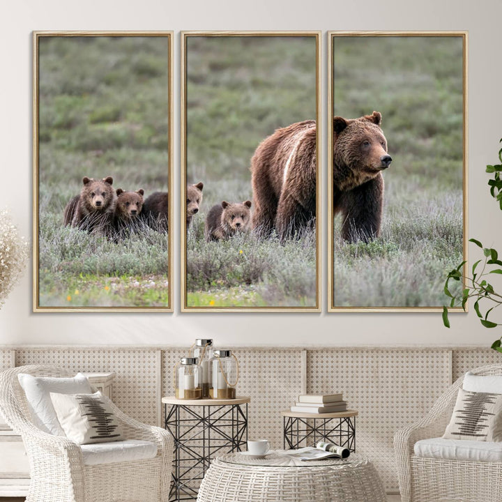 The large canvas print titled "Queen of the Tetons, 399 Grizzly Bear Cubs" showcases majestic wildlife photography of a bear and her cubs walking through the grass. This stunning canvas wall art, handmade in the USA, adds a charming touch to any room with its rustic decor appeal.