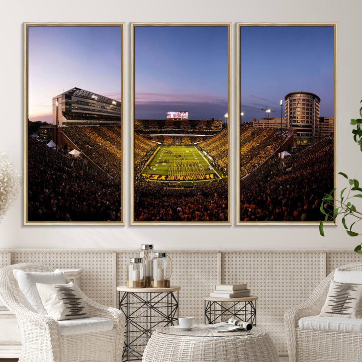 The Iowa Hawkeyes Kinnick Stadium Wall Art Canvas Print captures a sunset scene, making it perfect for display on a wall.