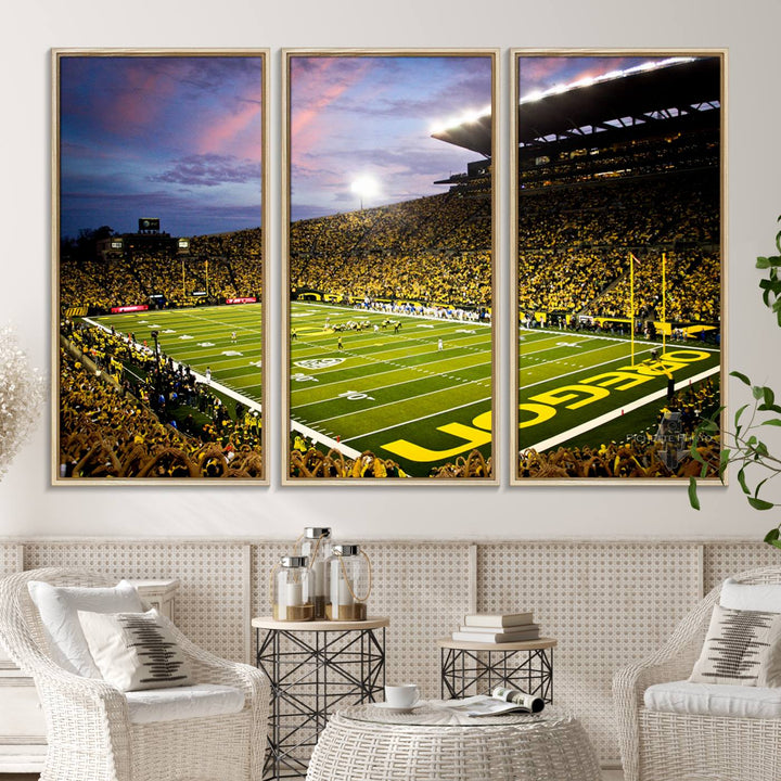 This gallery-quality canvas print features a depiction of the OREGON field filled with fans at sunset, capturing the essence of the University of Oregon Ducks Autzen Stadium.