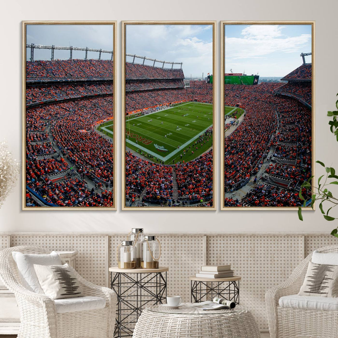 The Denver Broncos Football Print features a vibrant, fan-filled orange stadium overlooking the football field.