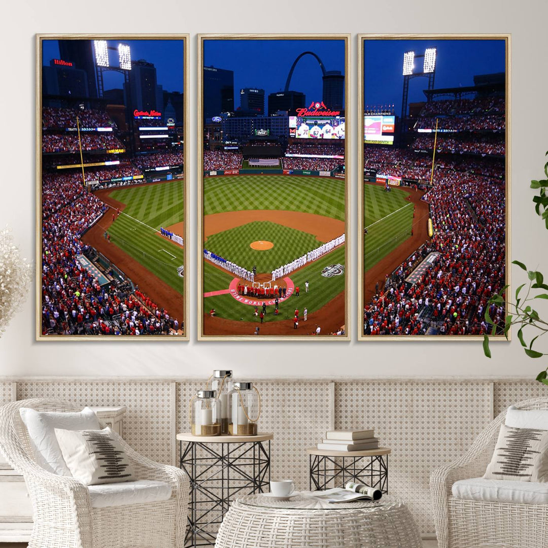 A Cardinals wall art canvas print depicts Busch Stadium with players lined up on the field and a full audience under the lights, capturing the vibrant atmosphere.