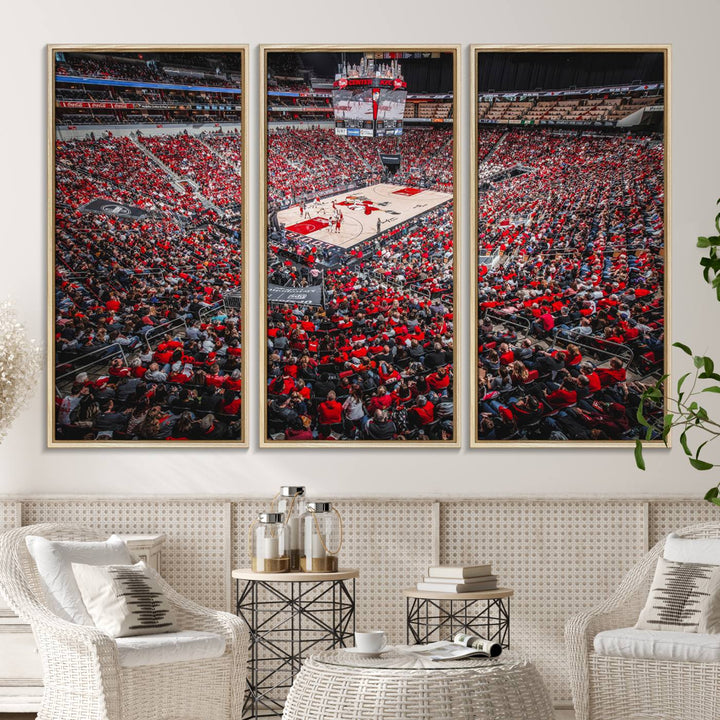 A painting of Louisville Cardinals fans in red at the KFC Yum Center Arena.