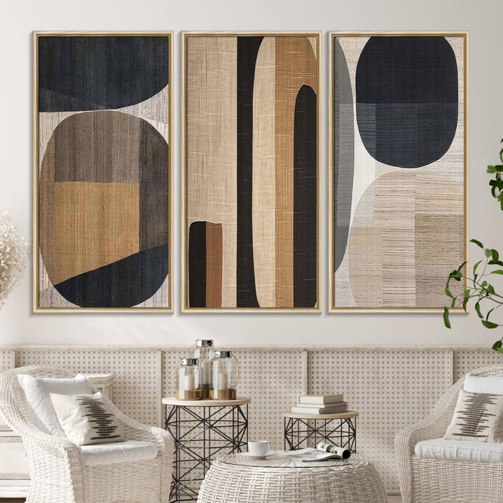 A modern dining room featuring neutral geometric boho abstract minimalist canvas art.