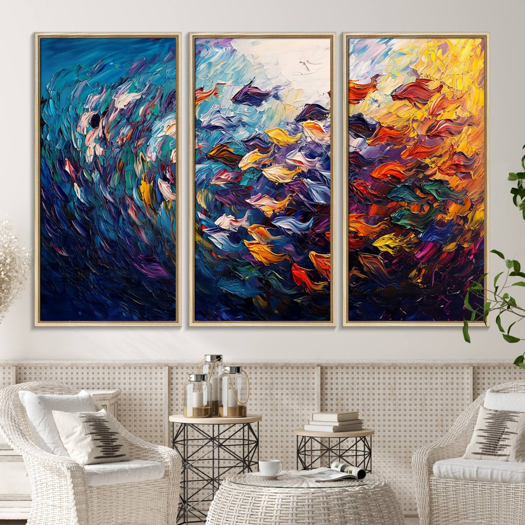 The Vibrant Abstract Fish Swarm Art features a colorful 3-piece canvas that adds a pop of color.