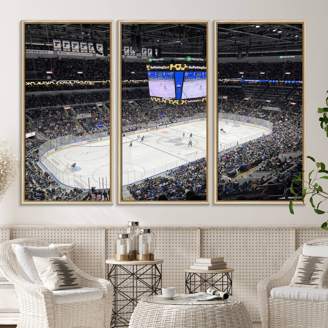 A large Enterprise Center canvas of a crowded hockey arena hangs prominently.