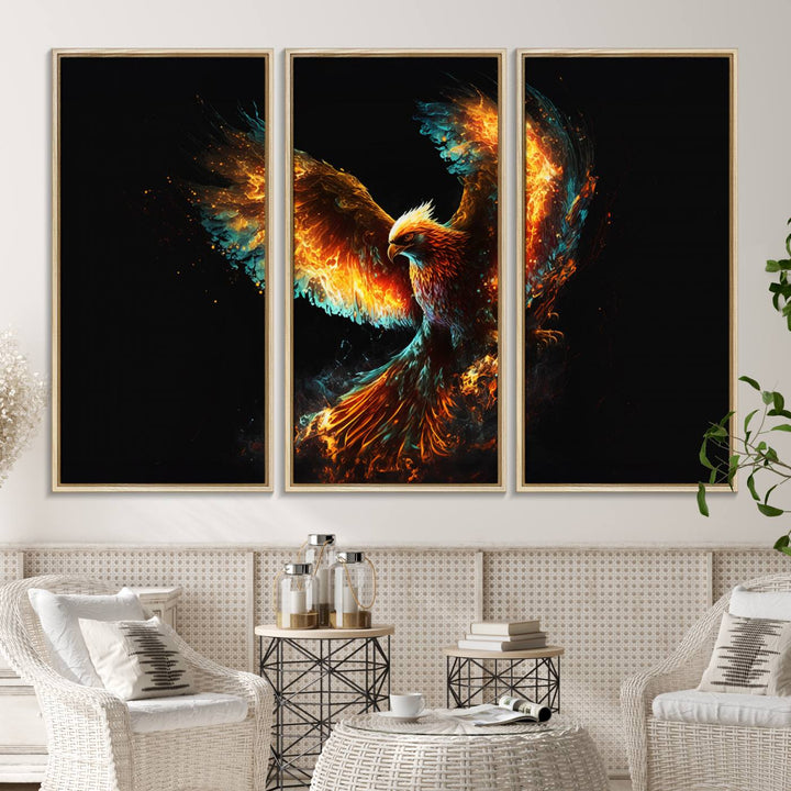 The Fiery Phoenix Canvas Print, showcasing a majestic bird with fiery wings against a black background, makes for the perfect bold decor in your living room.