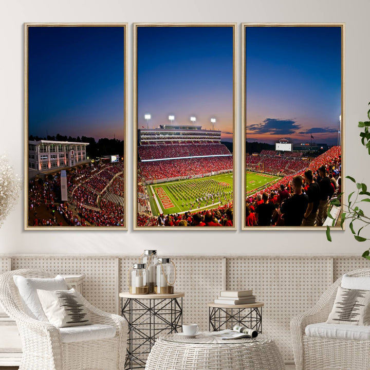 The Wolfpack Football Team Print captures a band and crowd at dusk in a premium canvas art style at Raleigh Carter-Finley Stadium.