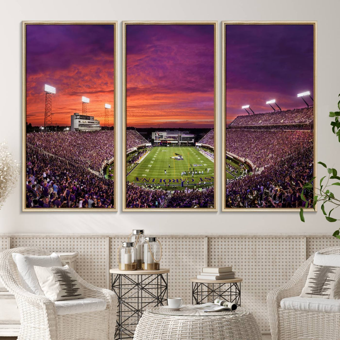 A sunset over Dowdy-Ficklen Stadium, Greenville, captured on museum quality canvas with vibrant purple and orange skies.