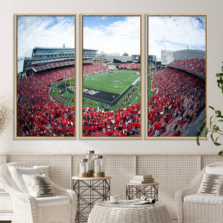 The wall showcases a Nippert Stadium canvas print of the Cincinnati Bearcats.