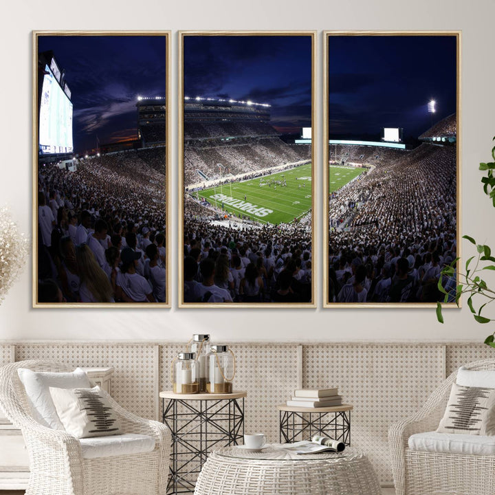 A packed football stadium at night, with bright lights and fans in white, depicted in a Michigan State Spartans Stadium wall art.