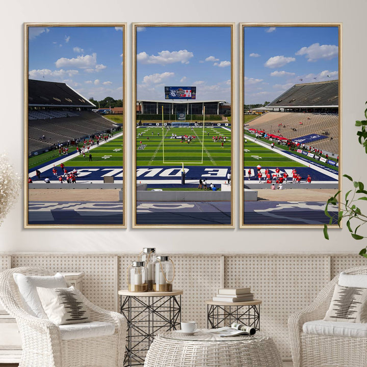 Rice Stadium print: This artwork features a football field with empty stands and a gallery-quality finish under a clear blue sky.