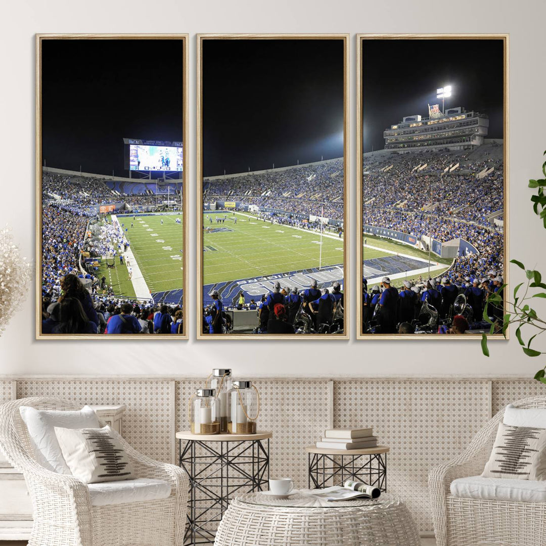 A vibrant depiction of Liberty Stadium at night, highlighting a Tigers football game on the large screen with stands filled with enthusiastic fans.