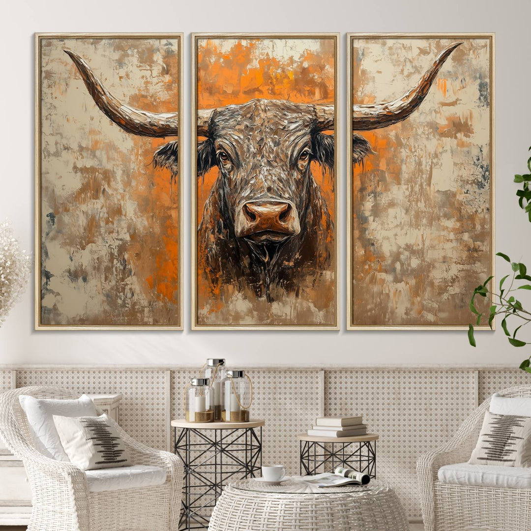 Abstract Cow Longhorn Bull Wall Art presents a detailed face centered on a textured orange and beige background.