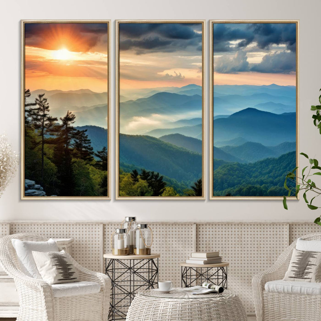 The wall art, titled Sunrise Over Mountain Range, is a canvas print that beautifully depicts layers of hills, scattered trees, and a partly cloudy sky.