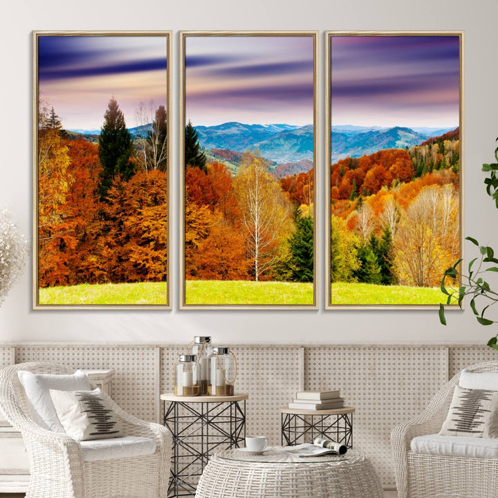 The wall art in the kitchen dining area is a large Autumn Forest Mountain Canvas Print that captures a vivid scenic landscape.