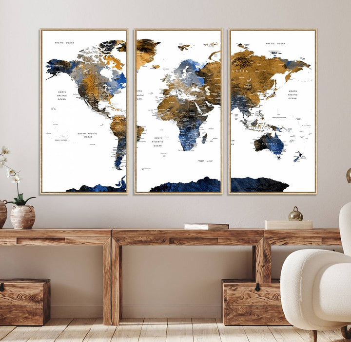 The Watercolor World Map Canvas showcases a grunge-stained background in gold, gray, and blue hues.