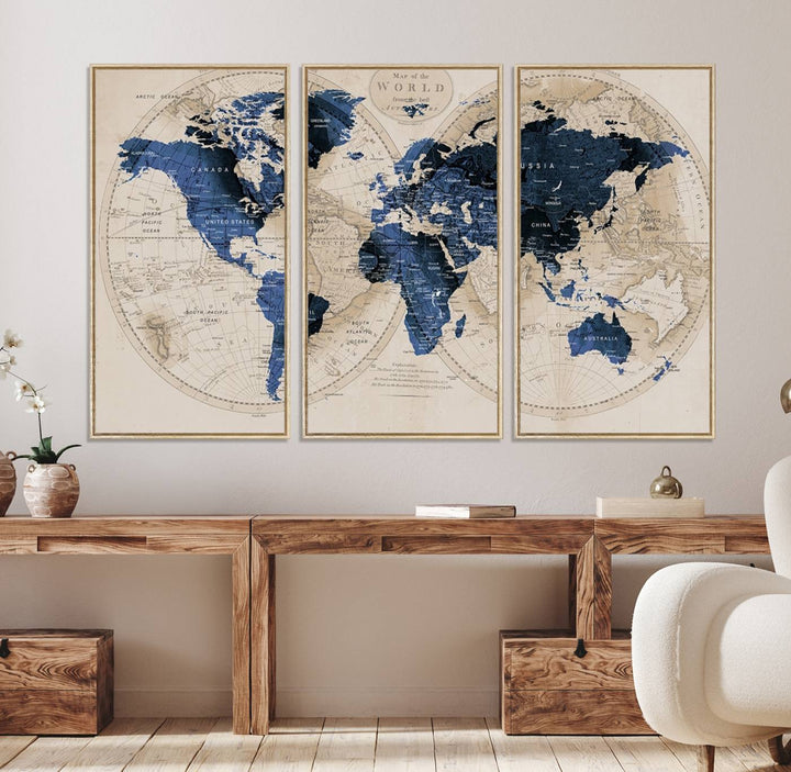 The Vintage Triptych Map Print is a grunge-stained blue and beige world map, perfect for enhancing wall decor.