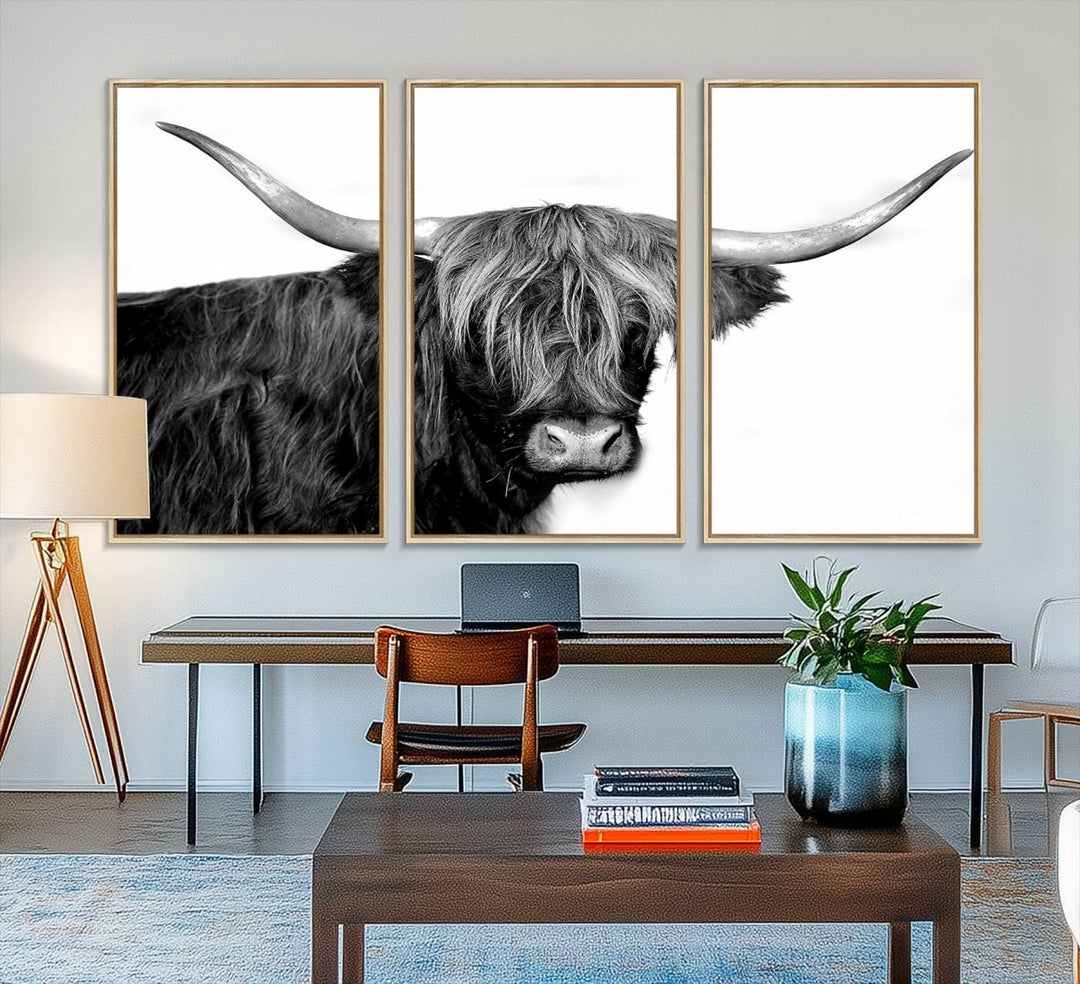 The Black and White Highland Cow Multi Panel Wall Art Canvas Print with UV-protection hangs prominently.