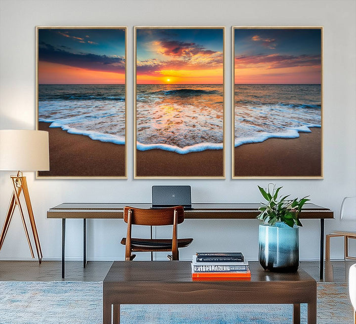 A Sunset with Calm Waves on the Beach Wall Art Canvas Print adorns the dining room.