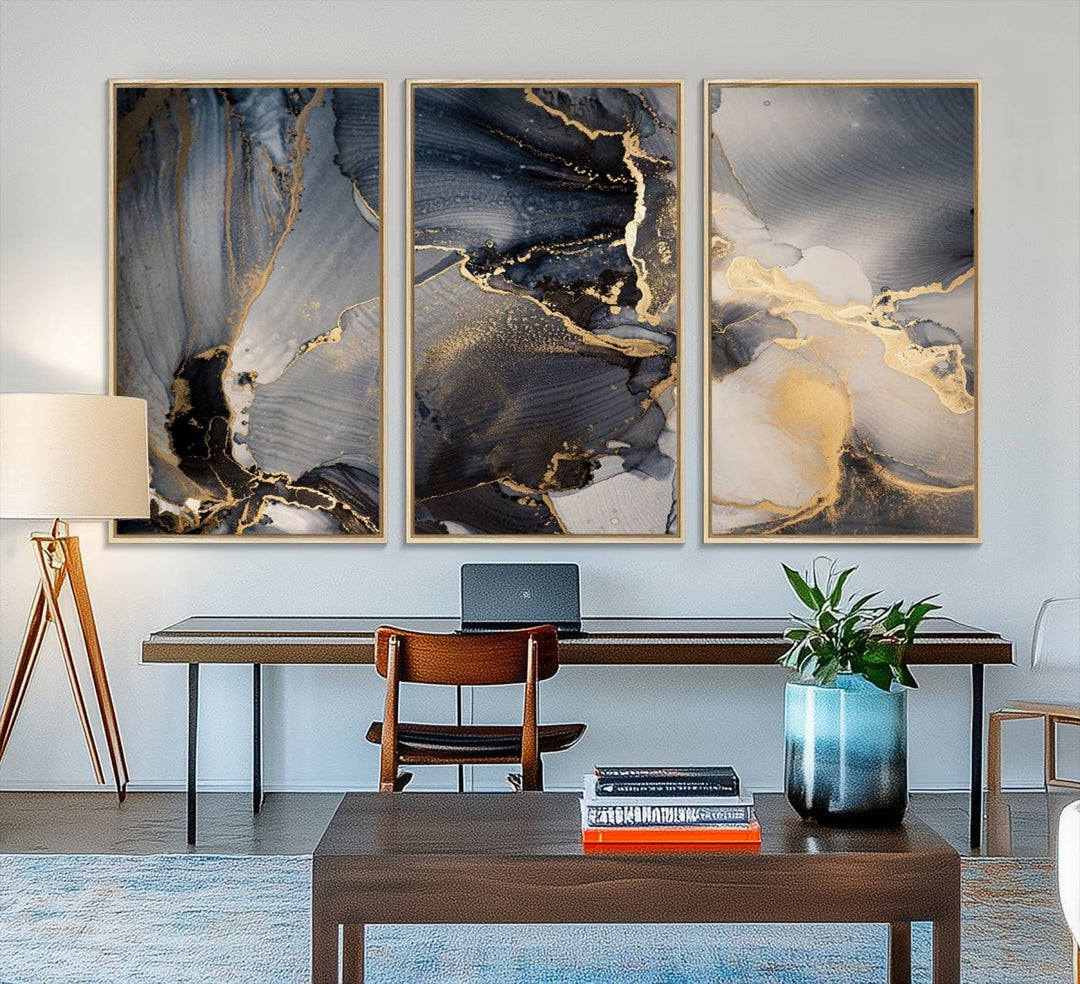 A Modern Marble Fluid Effect Abstract Wall Art with black, white, and gold swirls hangs in a modern kitchen.