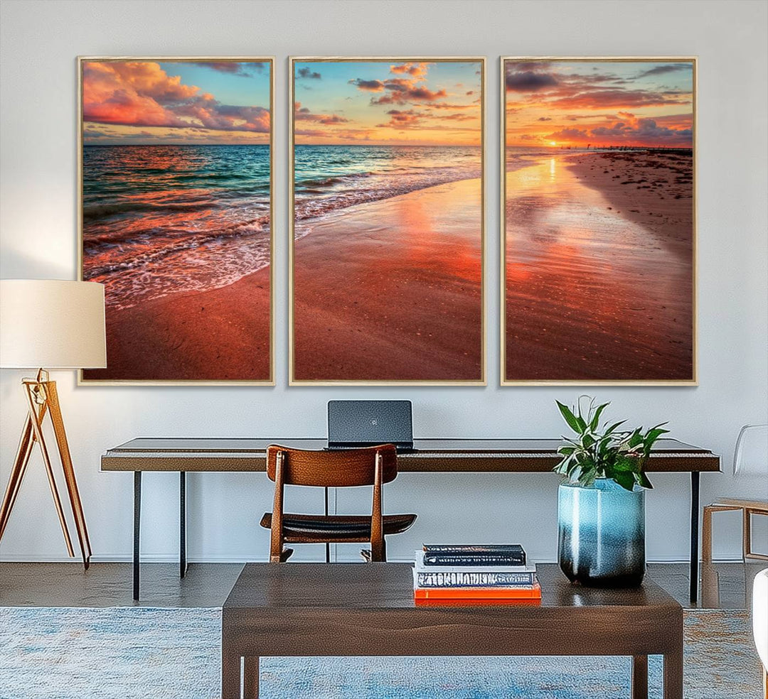 A Vibrant Sunset Beach Canvas Print with ocean waves and sandy shoreline enhances coastal-themed interiors.