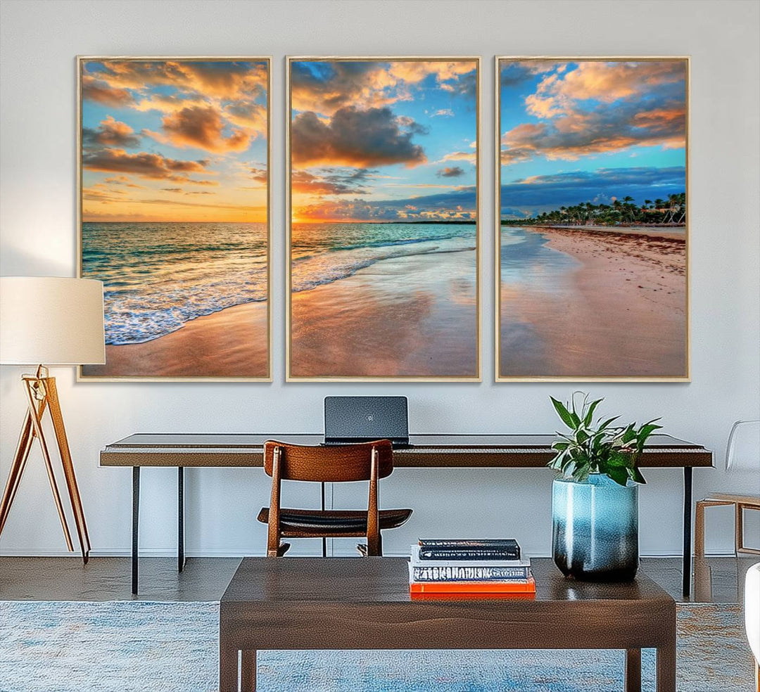 A wall displays Sunset Ocean Waves on Tropical Beach 3-panel canvas art.