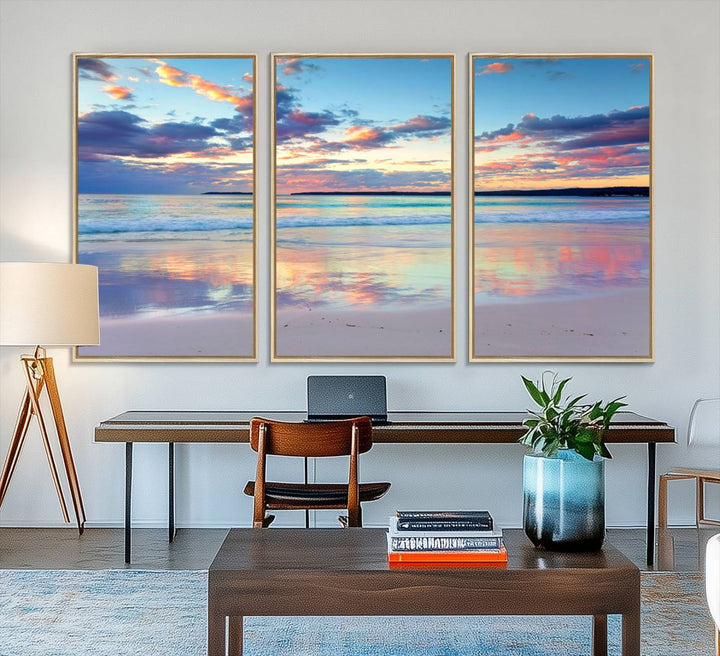 The Tranquil Pastel Sunset Beach Triptych Canvas Art hangs, showcasing its serene beauty.