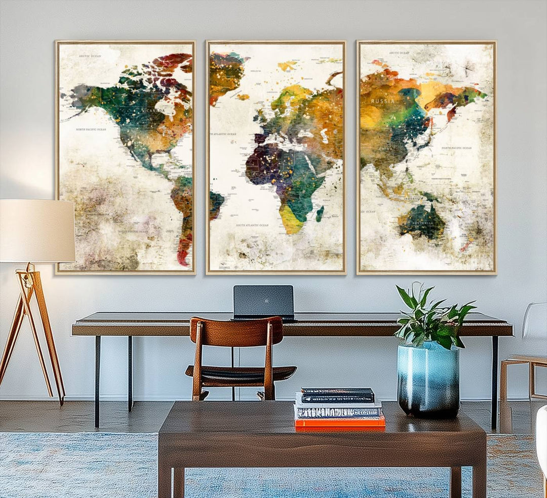 A 3-panel vintage world map canvas art is displayed.