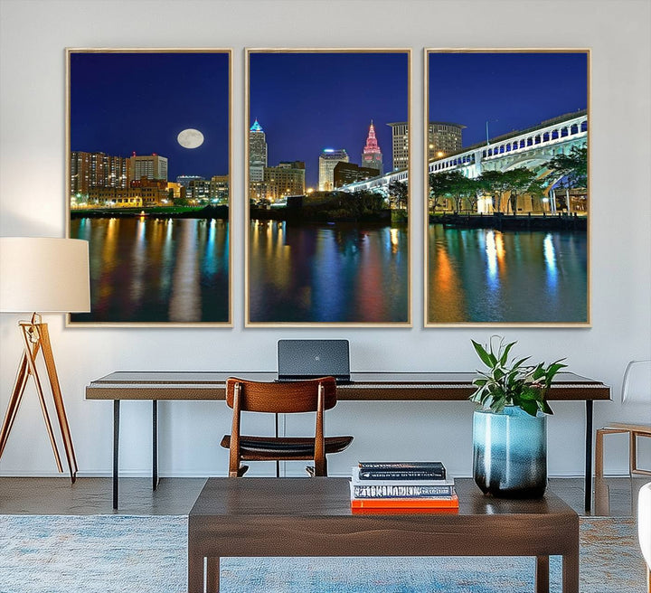 Cleveland City Lights Night Skyline Wall Art canvas showcases a moonlit cityscape reflected on water.