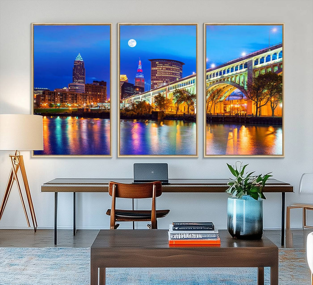 A Cleveland Night Skyline Wall Art on museum-quality canvas showcases a bridge and illuminated buildings.