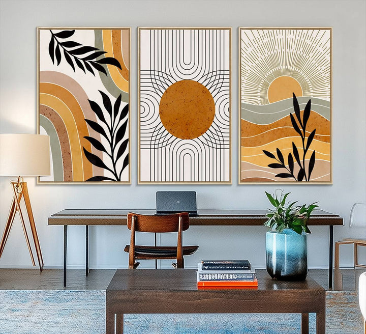 The Modern Boho Sun and Leaf giclée canvas is a 3-panel piece designed for mid-century or bohemian decor.