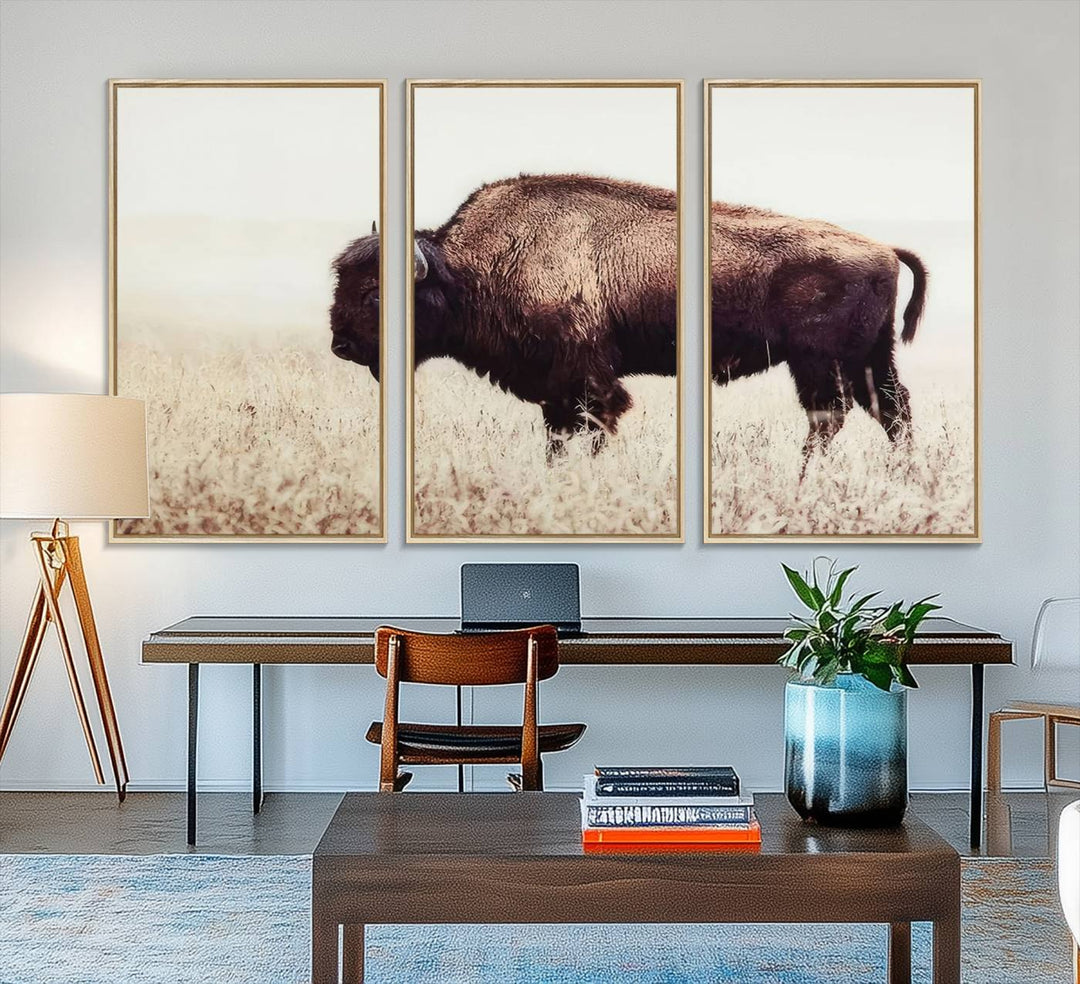 The dining room showcases the Bison in Field canvas print.