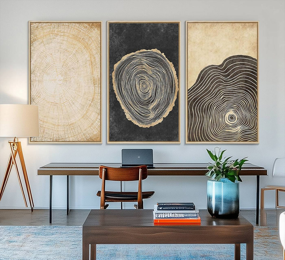 Tree Rings Canvas Wall Art Print hangs prominently in a modern kitchen.