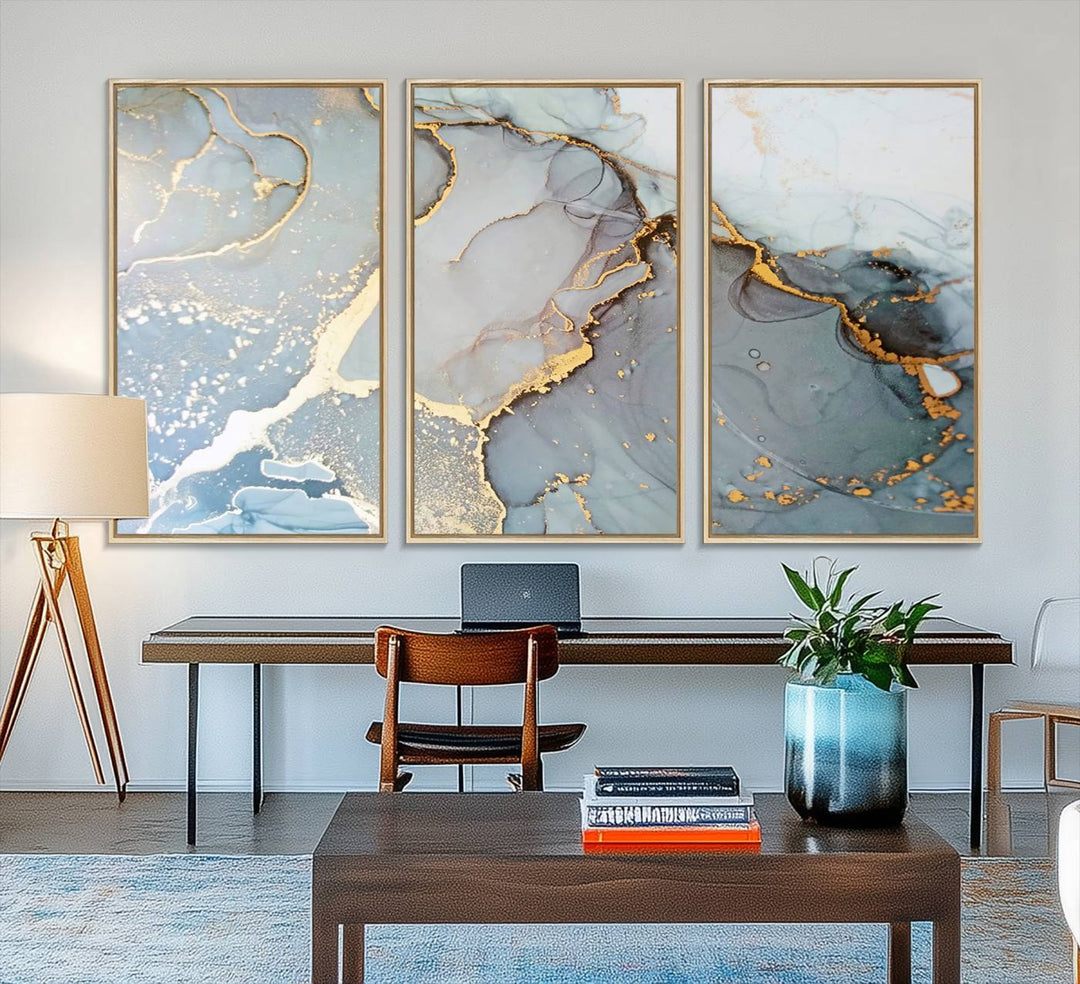 A blue and gold marbled Large Abstract Marble Wall Art Canvas Print hangs overhead.