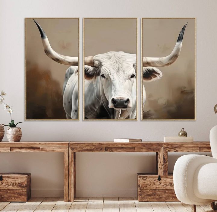 The kitchen features a striking canvas print of a Longhorn Bull.