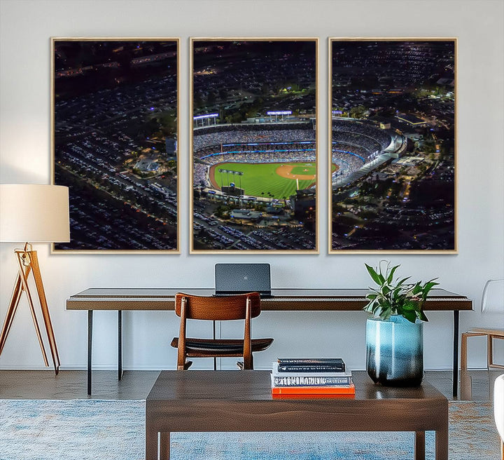 A large Los Angeles Dodgers print of Dodger Stadium at night is displayed near a window.